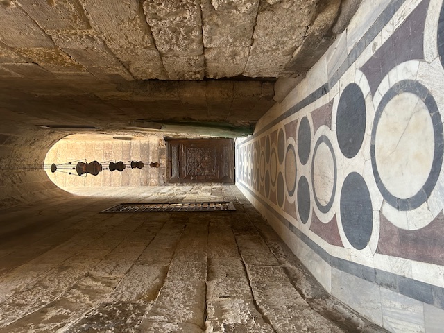 Traditional carved wooden Egyptian door with intricate details