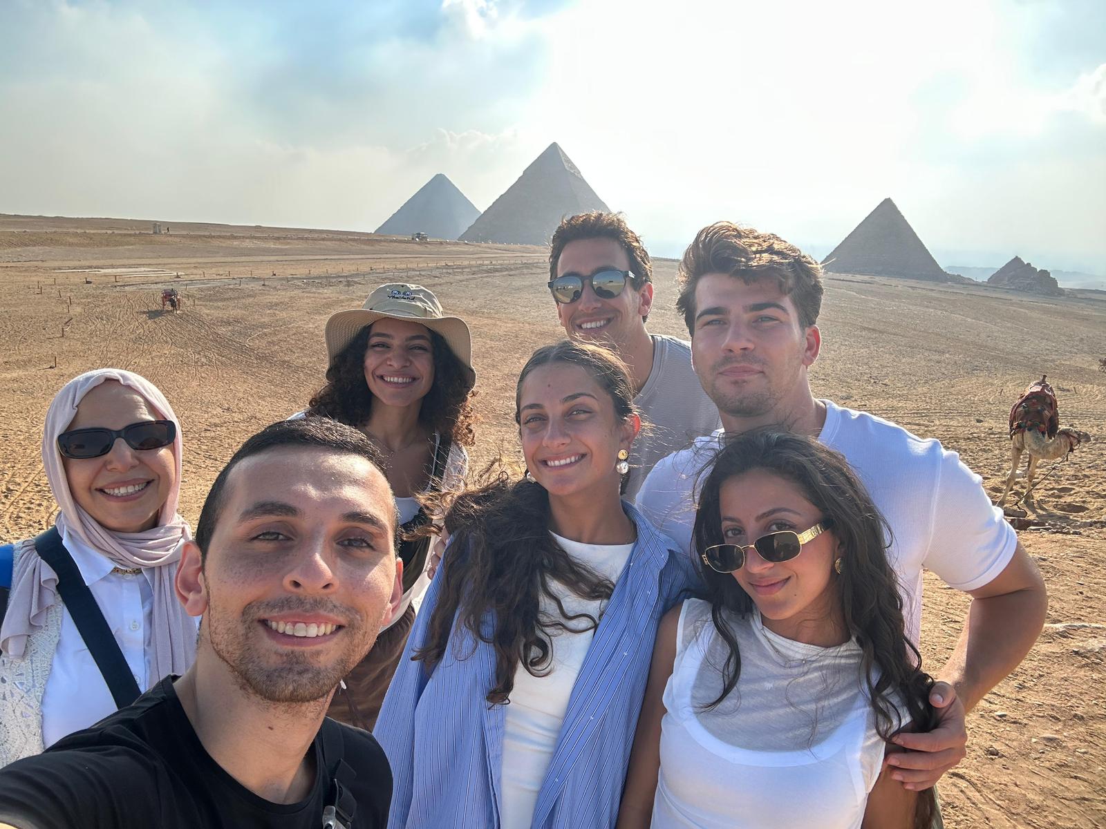 Friends taking a memorable selfie at the Pyramids of Giza