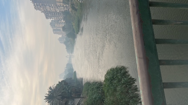 Serene Nile River sunset with golden light reflecting on water